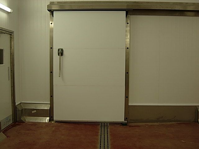 Internal flat slider door over fridge/freezer