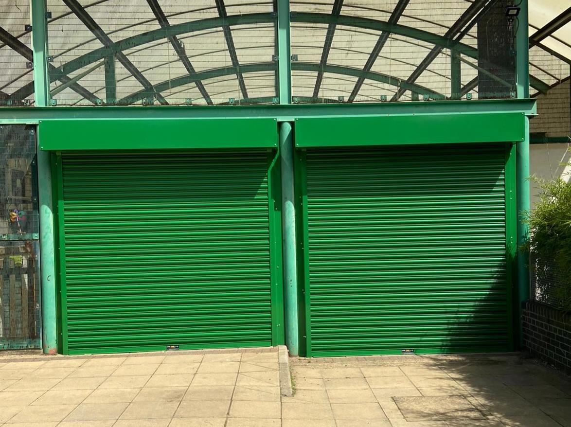 Green roller shutter used for extra security on site